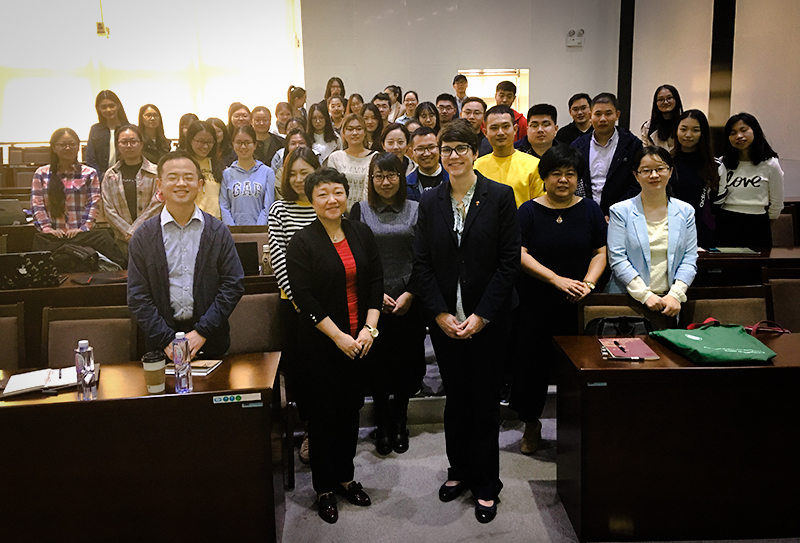 SIS Director Diane Kelly poses with faculty and students from Nankai University.