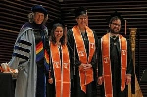 Assistant Professor Carolyn Hank with students Kelsey Collins, Elaine Posanka and Joseph Wineberry being given a Diversity & Inclusion Badget